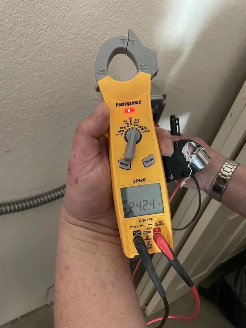 Voltage testing with clamp meter during Generator Installation in Blairsville